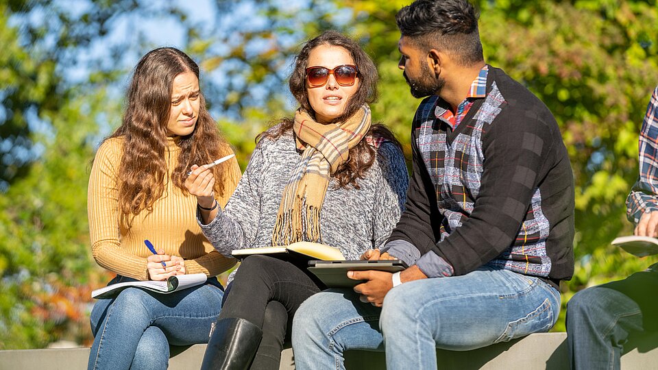 Students sitting outside